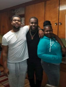 This family photo obtained by CNN on April 8, 2018 shows Marquise Byrd, left, with his brother and mother.
