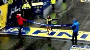 Desiree (Desi) Linden, a two-time Olympian, battled the rain and wind Monday to win the storied race. It's also the first win of the 34-year-old's career. (Credit: WBZ)