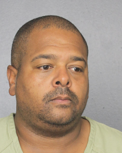 Sean Simpson is seen in a booking photo provided by the Broward County Sheriff's Office on April 12, 2018.