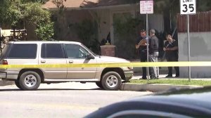 A vehicle used by a suspect in a fatal police shooting that left two officers injured is shown near the scene on April 9, 2018. (Credit: KTLA)