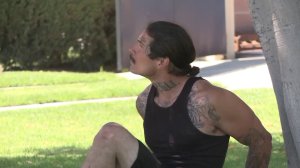 A man who was wanted on suspicion of assault with a deadly weapon on an officer on April 17, 2018 is taken into custody. (Credit: KTLA)