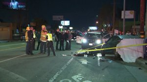 Police and fire officials respond to the scene of a double fatal hit-and-run crash in Tujunga on April 27, 2018. (Credit: KTLA)