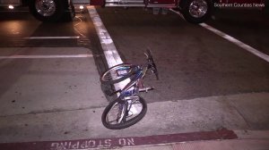 A bicycle is seen laying on the street after a deadly hit-and-run crash in Compton on May 20, 2018. (Credit: Southern Counties News)