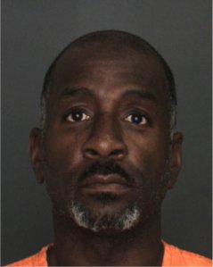 Dale Brewster is shown in a booking photo released by the San Bernardino County District Attorney's Office on May 24, 2018. 