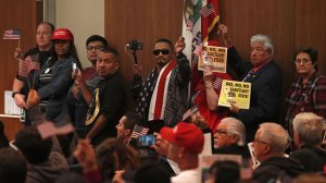 Opponents and supporters of California’s Senate Bill 54 crowded the Costa Mesa City Council meeting on May 1, 2018. (Credit: Kevin Chang / Daily Pilot)