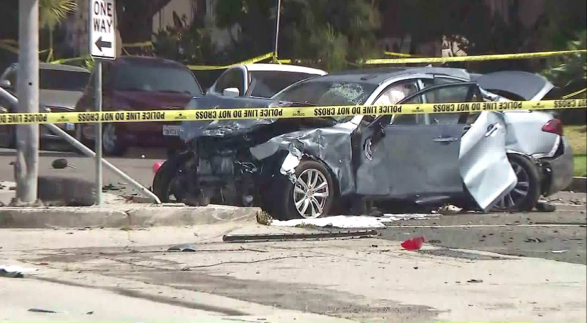 One of the vehicles involved in the crash sheared off a street sign at the scene on May 10, 2018. (Credit: KTLA)