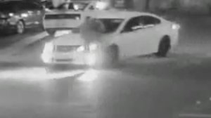 A still from surveillance video released by Downey police shows a security guard being run over in the parking lot of a Mexican restaurant on May 17, 2018.