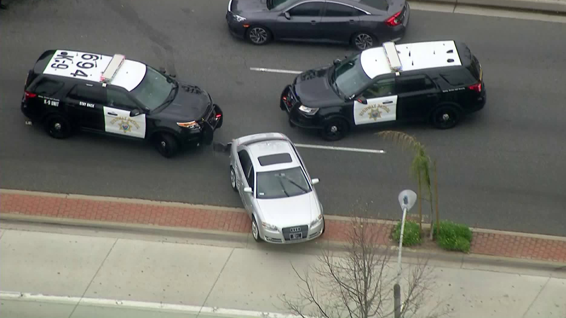 The driver of a stolen Audi flees after two CHP vehicles attempted to stop him on May 1, 2018. (Credit: KTLA)