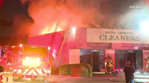 A fire rips through a strip mall in South Los Angeles on May 3, 2018. (Credit: RMG News)