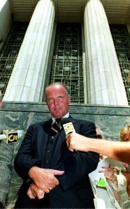 Los Angeles Police Sgt. Stacey Koon declines to answer questions from the media on Aug. 6, 1992, after a bail and custody hearing in U.S. District Court in Los Angeles. (Credit: Vince Bucci / AFP / Getty Images)