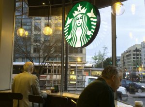 Patrons have morning coffee at a Starbucks in Washington, D.C on March 23, 2016. (Credit: Karen Bleier/AFP/Getty Images)