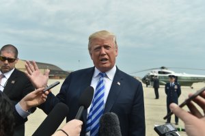 President Donald Trump speaks to the press as he arrives at Dallas Love Field Airport on May 4, 2018 in Dallas, Texas. (Credit: Nicholas Kamm / AFP) (Credit: Nicholas Kamm/AFP/Getty Images)