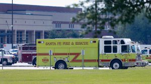 Emergency crews stage in the parking lot of Santa Fe High School where at least 10 students were killed on May 18, 2018 in Santa Fe, Texas. (Credit: Bob Levey/Getty Images)