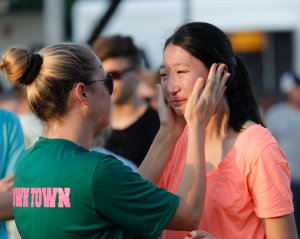 Friends and family attend a vigil held at the First Bank in Santa Fe for the victims of a shooting incident at Santa Fe High School, where a shooter killed at least 10 students on May 18, 2018, in Santa Fe, Texas. (Credit: Bob Levey / Getty Images)