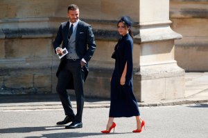 David and Victoria Beckham arrive for the wedding ceremony of Britain's Prince Harry, Duke of Sussex and US actress Meghan Markle at St George's Chapel, Windsor Castle, in Windsor, on May 19, 2018. (Credit: ODD ANDERSEN/AFP/Getty Images)