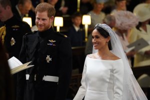 Britain's Prince Harry, Duke of Sussex and Meghan Markle arrive at the High Altar for their wedding ceremony in St George's Chapel, Windsor Castle, in Windsor, on May 19, 2018. (Credit: JONATHAN BRADY/AFP/Getty Images)