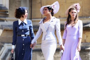 Abigail Spencer and Priyanka Chopra arrive for the wedding ceremony of Britain's Prince Harry, Duke of Sussex and US actress Meghan Markle at St George's Chapel, Windsor Castle, in Windsor, on May 19, 2018. (Credit: CHRIS JACKSON/AFP/Getty Images)