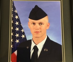 Cody M. Harter is seen in a family photo.