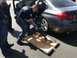 Santa Ana Police Department officials released this photo of a rifle found in a robbery suspect's car on May 3, 2018.