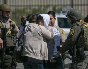 An image posted to Facebook by the Los Angeles County Sheriff's Department's Lancaster station shows two individuals hugging as officers respond to a shooting on May 11, 2018.