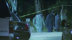 Authorities investigate a fatal shooting in Paramount on May 9, 2018. (Credit: KTLA)