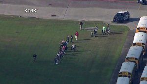 Students leave a high school campus in Santa Fe, Texas after reports of a shooting there on May 18, 2018. (Credit: KTRK via CNN)