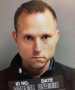 Thomas Tramaglini, 42, is seen in a booking photo provided to WGHP.