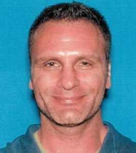 Greg Alyn Carlson is seen in a 2014 photo provided by the FBI.