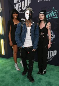 Rapper XXXTentacion, center, attended the BET Hip Hop Awards 2017 at The Fillmore Miami Beach at the Jackie Gleason Theater on October 6, 2017 in Miami Beach, Florida. (Credit: Bennett Raglin/Getty Images for BET )