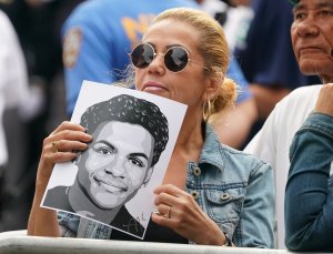 Members of the public gather outside the funeral for Lesandro "Junior" Guzman-Feliz on June 27, 2018, in New York. (Credit: Don Emmert / AFP / Getty Images)