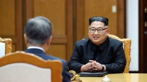 South Korean President Moon Jae-in talks with North Korean leader Kim Jong-un during their meeting on May 26, 2018 in Panmunjom, North Korea. (Credit: South Korean Presidential Blue House via Getty Images)