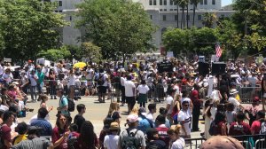 Demonstrators take part in the “Families Belong Together” march in downtown Los Angeles on June 30, 2018. (Credit: KTLA)
