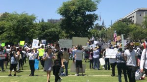 Protesters participate in the “Families Belong Together” march in downtown Los Angeles on June 30, 2018. (Credit: Erin Myers/KTLA)