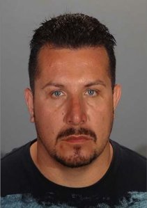 Nelson Rodriguez, 40, of Bloomington is shown in a booking photo released by the Glendale Police Department on June 13, 2018.