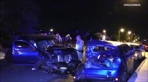 A pickup allegedly driven by Los Angeles County Sheriff's Deputy Nicholas Smith is seen after it crashed into five parked vehicles in Palmdale on June 17, 2018. (Credit: Don Luis Meza)