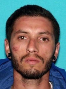 Raymond Joseph Penland is seen in a photo released by authorities on June 30, 2018. He is accused of fatally shooting two men in Downey that same day.