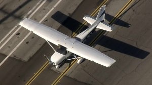 Sky5 shows a single-engine Cessna that landed on Hamilton Avenue in Huntington Beach on June 1, 2018. (Credit: KTLA)