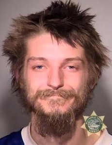 Portland police officers say a homeless man is being charged with a hate crime after yelling homophobic slurs at a group and assaulting a man Sunday night. (Credit: Portland PD)