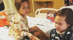Kalea and Noah Avery hold hands as Kalea recovers at the hospital in this undated photo on the children's GoFundMe page.