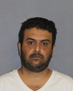 Imran Saaduddin Ahmad is shown in a booking photo released by the Irvine Police Department on July 3, 2018.
