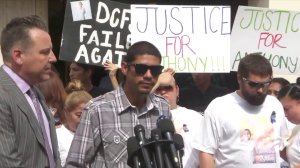 Victor Avalos, center, speaks during a news conference about his son Anthony Avalos' death on July 17, 2018. He is flanked by the family's attorney, Brian Claypool, and David and Maria Barron. (Credit: KTLA)