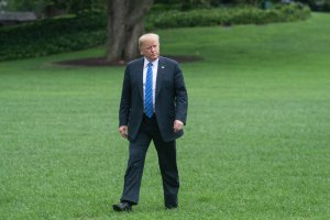 Donald Trump walks to the White House on July 24, 2018 upon his return from Kansas City, Missouri where he addressed the 119th Veterans of Foreign Wars National Convention. (Credit: Nicholas Kamm/AFP/Getty Images)