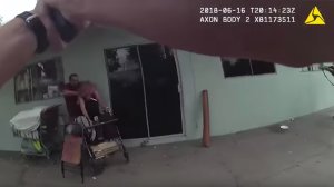 A still from video released by the LAPD shows the moments before a man and his hostage were fatally shot by police during an incident in Van Nuys on June 16, 2018.