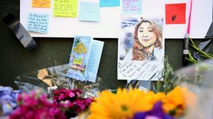 A portrait of Melyda Corado is pinned to a memorial outside Trader Joe's in Silver Lake. (Credit: Christina House / Los Angeles Times)