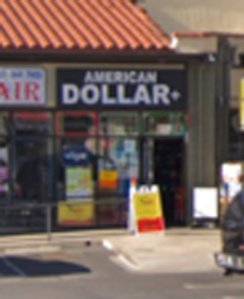 Police also released this photo of the American Dollar Plus store where the suspect worked.