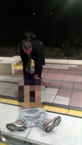 A video posted on BillionGODSun's YouTube page on Aug. 1, 2018 shows a man dragging an unresponsive man off a Blue Line train in Long Beach.