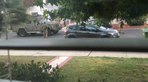 Police activity outside an Encino home where a man suspected of making threats against the Boston Globe is shown in a photo provided to KTLA by a neighbor on Aug. 30, 2018. (Credit: KTLA)