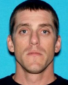 Troy Shellenbaum is seen in a booking photo provided by the Fountain Valley Police Department on Aug. 7, 2018.