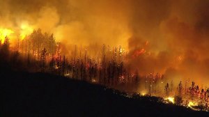 The Holy Fire scorches land in the Cleveland National Forest as it burns near Lake Elsinore on Aug. 7, 2018. (Credit: KTLA)