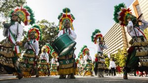 Mexican dancers begin a procession on Aug. 25, 2018 in celebration of Los Angeles' 237th birthday. (Credit: Maria Alejandra Cardona / Los Angeles Times)